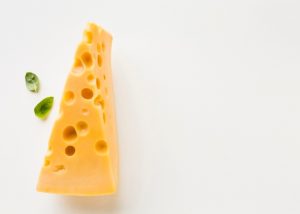 top-view-emmental-cheese-with-copy-space_23-2148376063